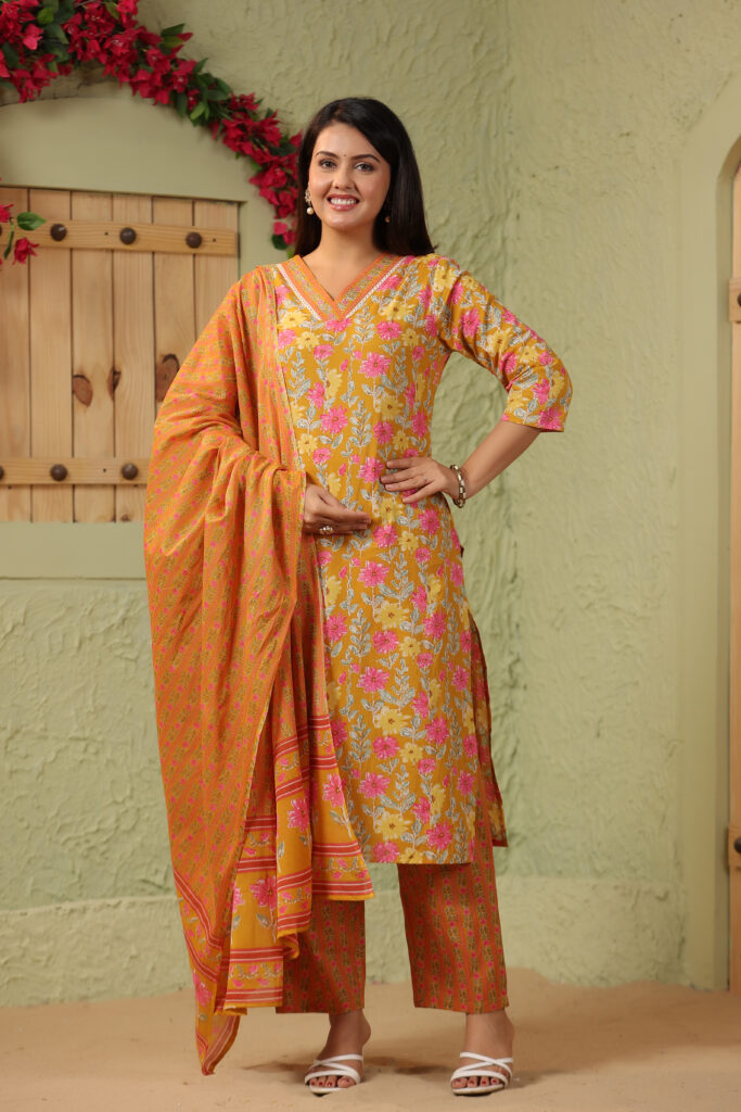 Mustard Yellow Cotton Kurta Set with Pink and White Floral Pattern