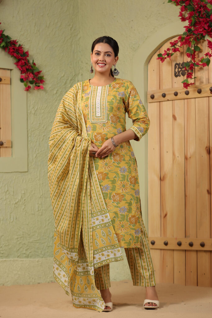 Yellow Cotton Kurta Set with Floral Patterns and Round Neck